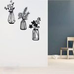 ensemble décoratif mural en métal noir avec vases